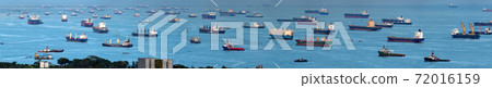 [Logistics] Large panorama of a container ship anchored in the Singapore Strait 72016159