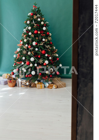Winter Christmas tree pine with gifts decor interior new year Winter Christmas tree pine with gifts decor interior new year 72017444