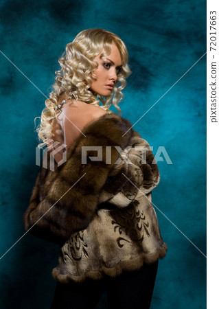 Young Woman In Fur Coat 72017663