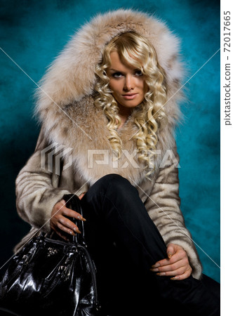 Young Woman In Fur Coat 72017665