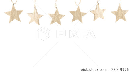 Wooden stars christmas decoration hanging on white background 72019976