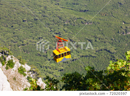 Cable car high in the mountains. Selective focus Cable car high in the mountains. Selective focus 72020397