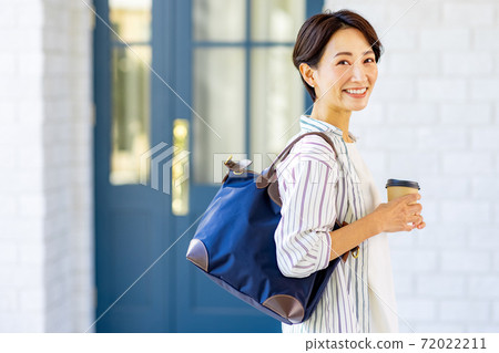 Career woman attending work 72022211