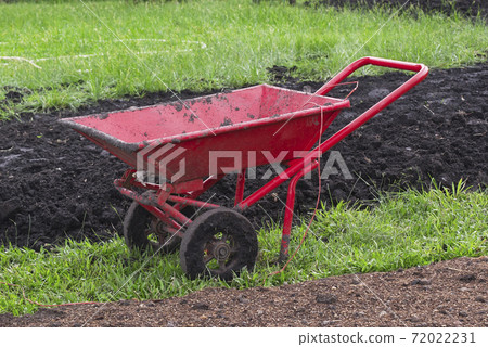 Dual Wheel Barrow, Double Wheel Cement Cart in the garden. 72022231