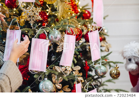 The Christmas tree was decorated with protective masks. The Christmas tree was decorated with protective masks. 72023484