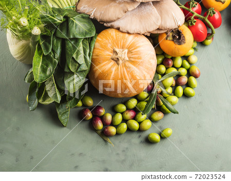 Green background with raw organic vegetable, fruit 72023524