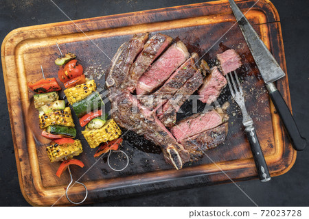 Barbecue dry aged wagyu beef cutlet with vegetable skewer  72023728