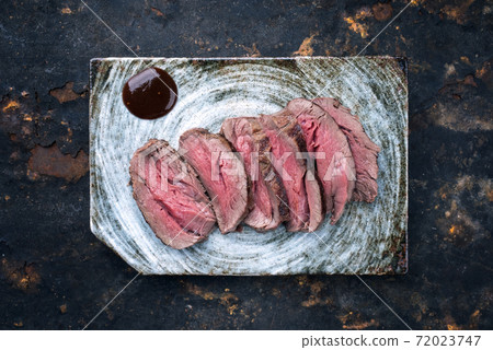 Japanese barbecue wagyu dry aged fillet steak slices  72023747