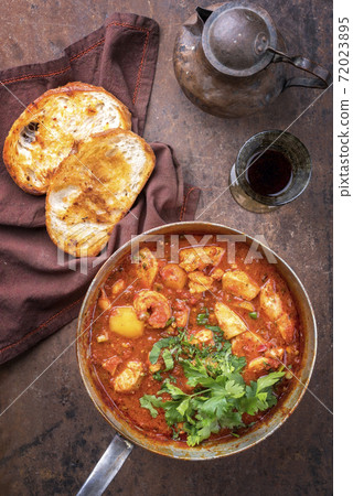 Creole cajun court bouillon with fish and seafood gumbo chowder stew  72023895