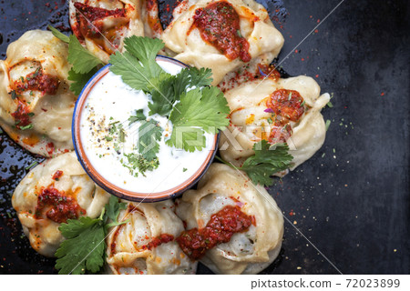 Traditional Uzdek manti steamed with mincemeat with tartar  72023899