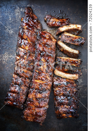 Barbecue spare ribs St Louis style with hot honey chili marinade Barbecue spare ribs St Louis style with hot honey chili marinade 72024139