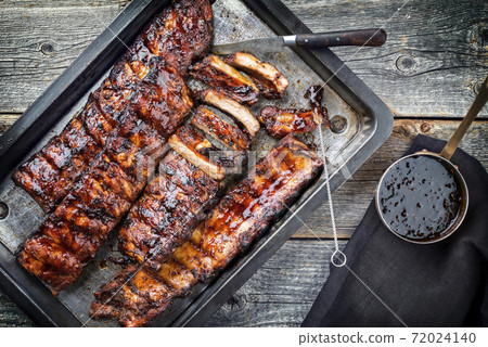Barbecue spare ribs St Louis style with hot honey chili marinade 72024140