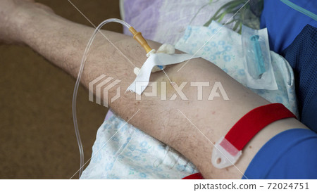 Work of doctors in the infectious diseases Department. Medical worker in protective clothing. 72024751