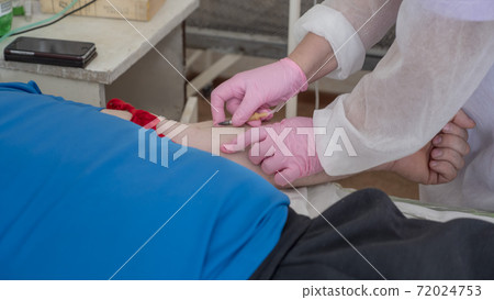 Work of doctors in the infectious diseases Department. Fighting a new virus infection Covid 19. Work of doctors in the infectious diseases Department. Fighting a new virus infection Covid 19. 72024753