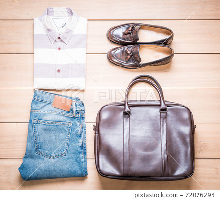 Clothing for men on the wooden background 72026293