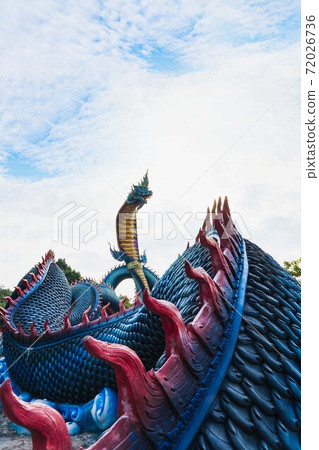 "Wat Roi Phra Putthabat Phu Manorom"Mukdahan , Thailand - November 10 , 2020:a temple high up in the hillside.Buddhist pray and walk around the naga "Wat Roi Phra Putthabat Phu Manorom"Mukdahan , Thailand - November 10 , 2020:a temple high up in the hillside.Buddhist pray and walk around the naga 72026736