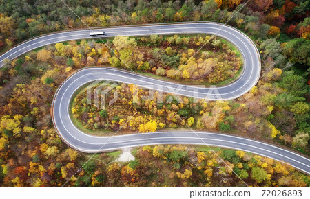 Road in autumn scenery - aerial shot 72026893