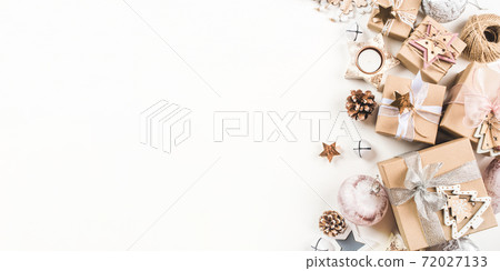 Festive Christmas background with gift boxes and Christmas decorations 72027133