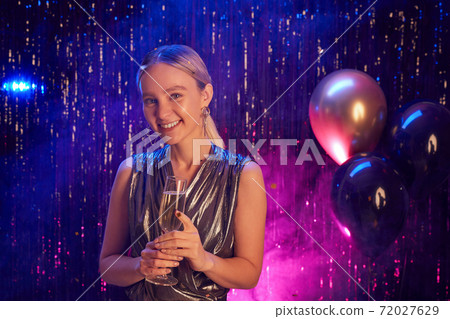 Smiling Teenage Girl at Party 72027629