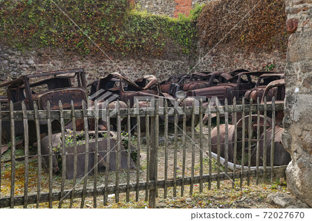 Destroyed cars during World War 2 in the city Oradour sur Glane France 72027670