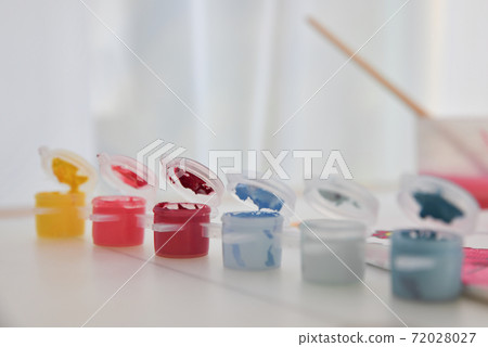 Palette with paints and water with a brush for children Palette with paints and water with a brush for children 72028027