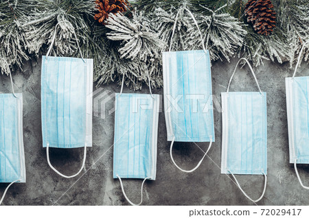 New reality, xmas tree decorated with face masks New reality, xmas tree decorated with face masks 72029417
