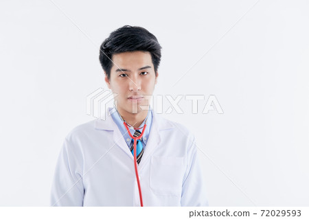 young man doctor posing with a stethoscope 72029593
