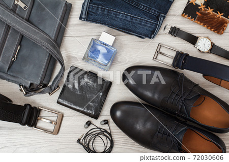 Shoulder bag, pair of black leather men's shoes, belts for men, jeans and accessories. Shoulder bag, pair of black leather men's shoes, belts for men, jeans and accessories. 72030606