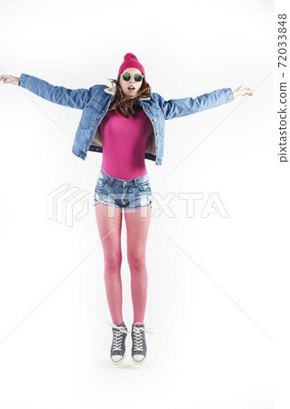 young pretty teenage girl jumping cheerful isolated on white background, lifestyle people concept young pretty teenage girl jumping cheerful isolated on white background, lifestyle people concept 72033848