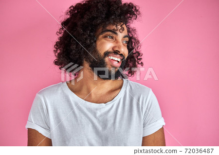 happy man cheerfully smiling isolated in studio happy man cheerfully smiling isolated in studio 72036487