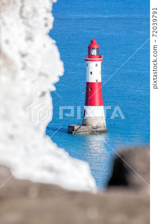 Beachy Head Lighthouse with chalk cliffs near the Eastbourne, East Sussex, England 72039791