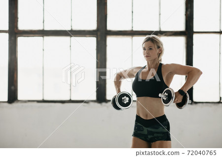 Online strength workout with trainer at home or gym during lockdown, pandemic and self-isolation Online strength workout with trainer at home or gym during lockdown, pandemic and self-isolation 72040765