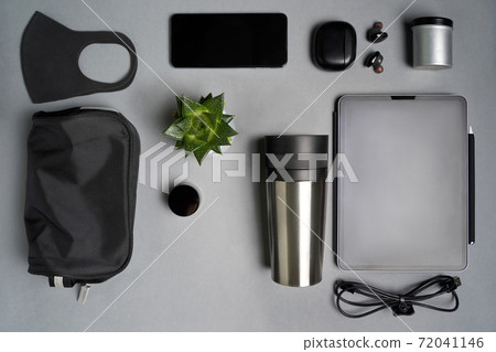 Everyday kit cup, tablet, phone, earphones, mask, bag and succulent  72041146