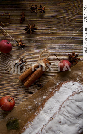 Christmas cupcake with cinnamon, apples and anise stars on wooden table 72042742
