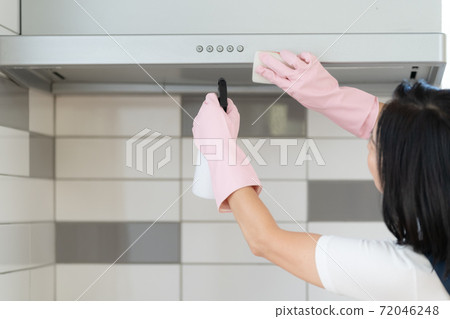 Middle woman of housekeeping staff 72046248