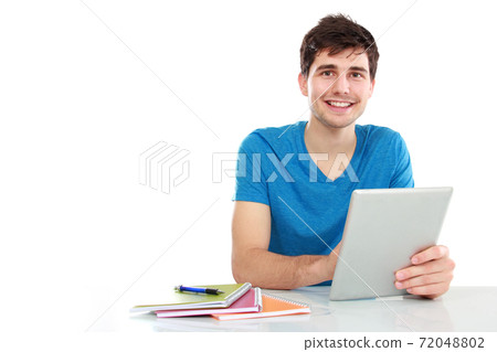 young student using tablet pc young student using tablet pc 72048802