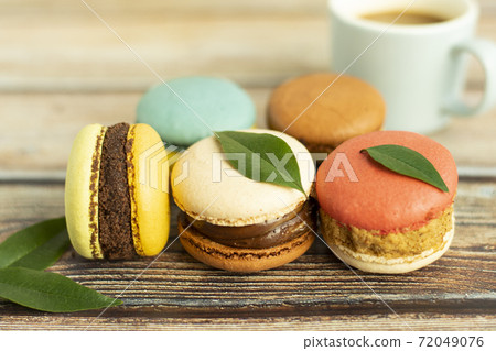 Macaron production image on wood background Macaron production image on wood background 72049076