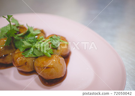 Thai pork balls with brown sweet sauce. Thai pork balls with brown sweet sauce. 72050042