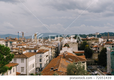 Cityscape view of Florence, Italy, on the dome of the Palazzo Vecchio 72051439