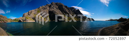 Sea landscape of Nusfjord village and harbour at flakstadoya Island , Lofoten , Norway Sea landscape of Nusfjord village and harbour at flakstadoya Island , Lofoten , Norway 72052897