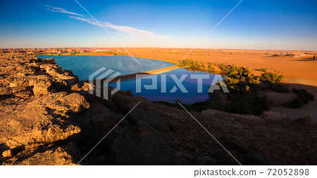 Sunset aerial Panoramic view to Yoa lake group of Ounianga kebir lakes at the Ennedi, Chad 72052898