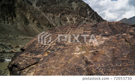 Petroglyphs at the bank of Indus river, Gilgit-Baltistan Pakistan Petroglyphs at the bank of Indus river, Gilgit-Baltistan Pakistan 72053730
