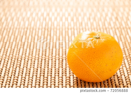 One mandarin orange. 72056888