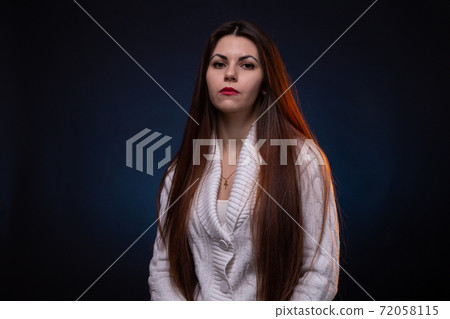 Image of brunette young woman with long hair Image of brunette young woman with long hair 72058115