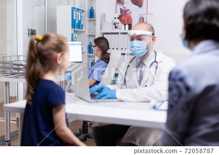 Nurse wearing face mask Nurse wearing face mask 72058787
