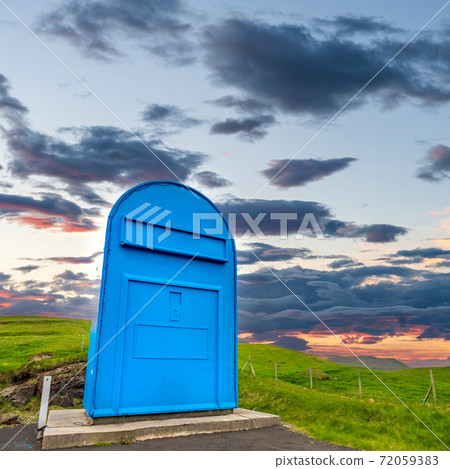 Huge postbox under the sky at dusk Huge postbox under the sky at dusk 72059383