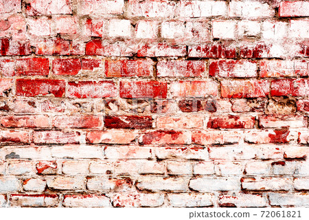 Texture of a brick wall with cracks and scratches which can be used as a background Texture of a brick wall with cracks and scratches which can be used as a background 72061821