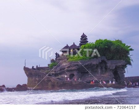 Tanah Lot and sea waves in golden sunset, Bali Tanah Lot and sea waves in golden sunset, Bali 72064157