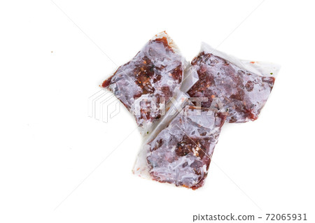 Homemade minced barf raw food for dogs packaged and frozen in serving size for preservation. 72065931