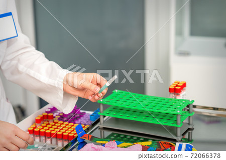 Prepare tools for blood sampling 72066378